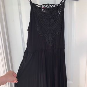 Black minidress with lace front and ties on side